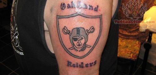 Oakland Raiders Grey Ink Tattoo On Bicep